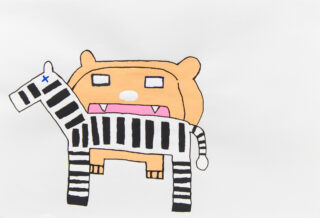 The zebra is being eaten after being attacked by a lion